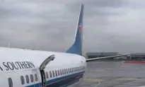 Passenger Opens Emergency Door on Plane in China