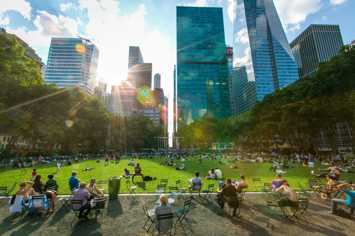 People enjoy a summer evening performance at Bryant Park in Manhattan on July 10, 2015. (Benjamin Chasteen/Epoch Times)