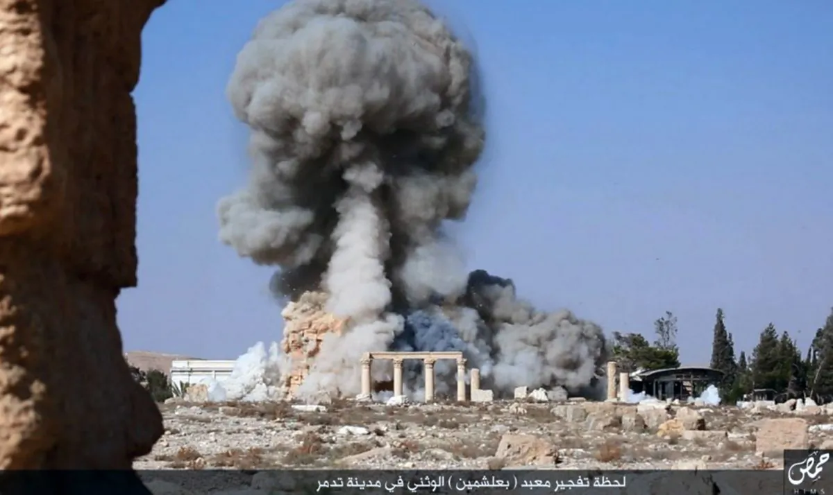 This undated photo, released Aug. 25, 2015, on a social media site used by ISIS militants, which has been verified and is consistent with other AP reporting, shows smoke from the detonation of the 2,000-year-old temple of Baalshamin in Syria's ancient caravan city of Palmyra. (Islamic State social media account via AP)