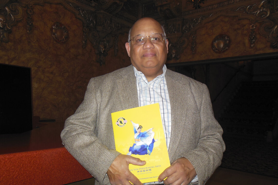 Saeed Sarwar enjoyed the family values displayed in Shen Yun Performing Arts on March 12. He hopes the company will return to Rockford next year. (Sally Sun/Epoch Times) 