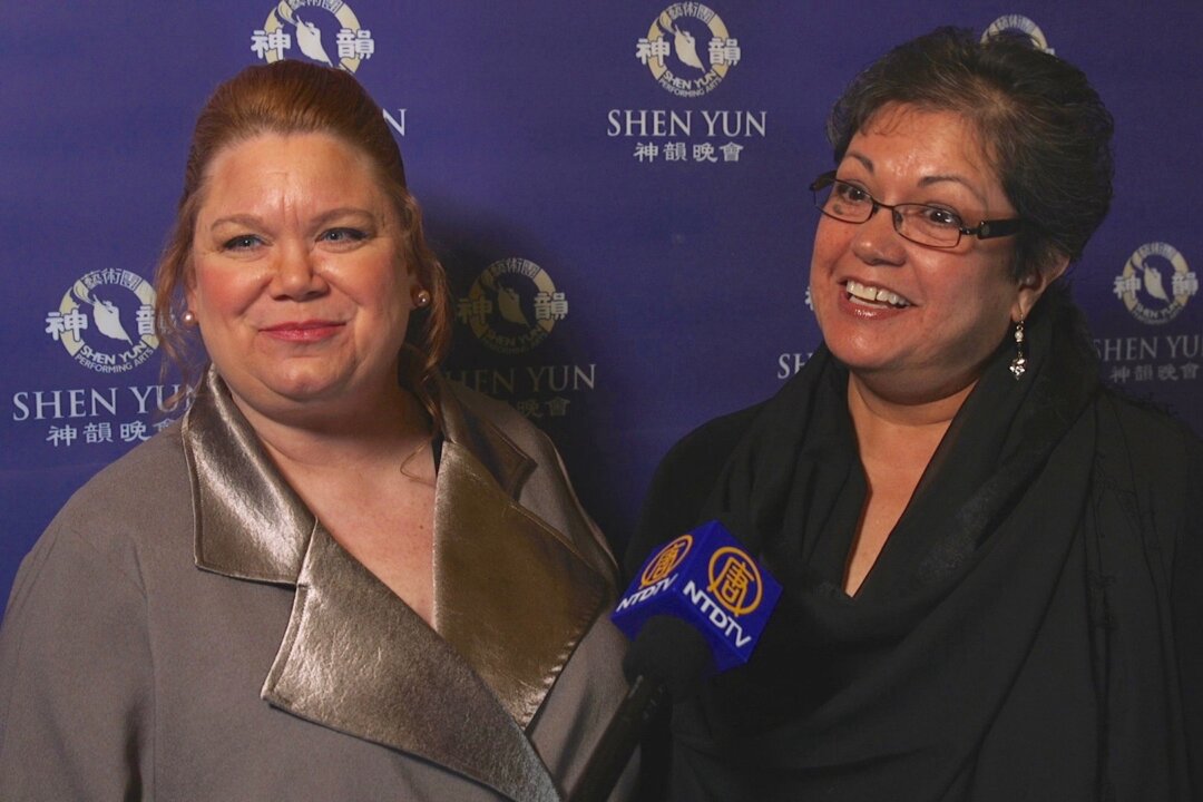 (L–R) Audrey Carpenter and Alicia Smith after enjoying their experience of Shen Yun Performing Arts in Rockford's Coronado Theatre. (Courtesy of NTD Television)