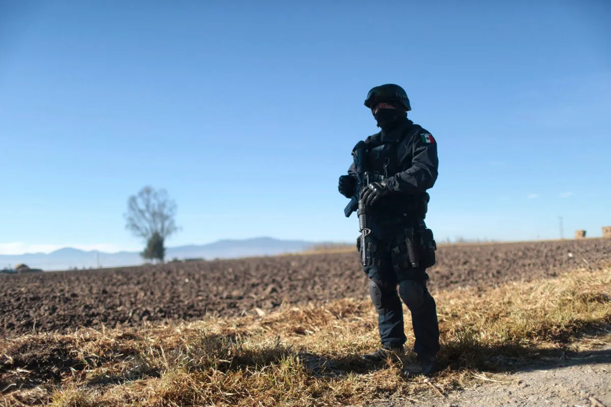 A Mexican Federal Police officer stands guard near the Almoloya Prison in Almoloya de Juarez, Mexico, on Jan. 9, 2016. (Pedro Parto/AFP/Getty Images)
