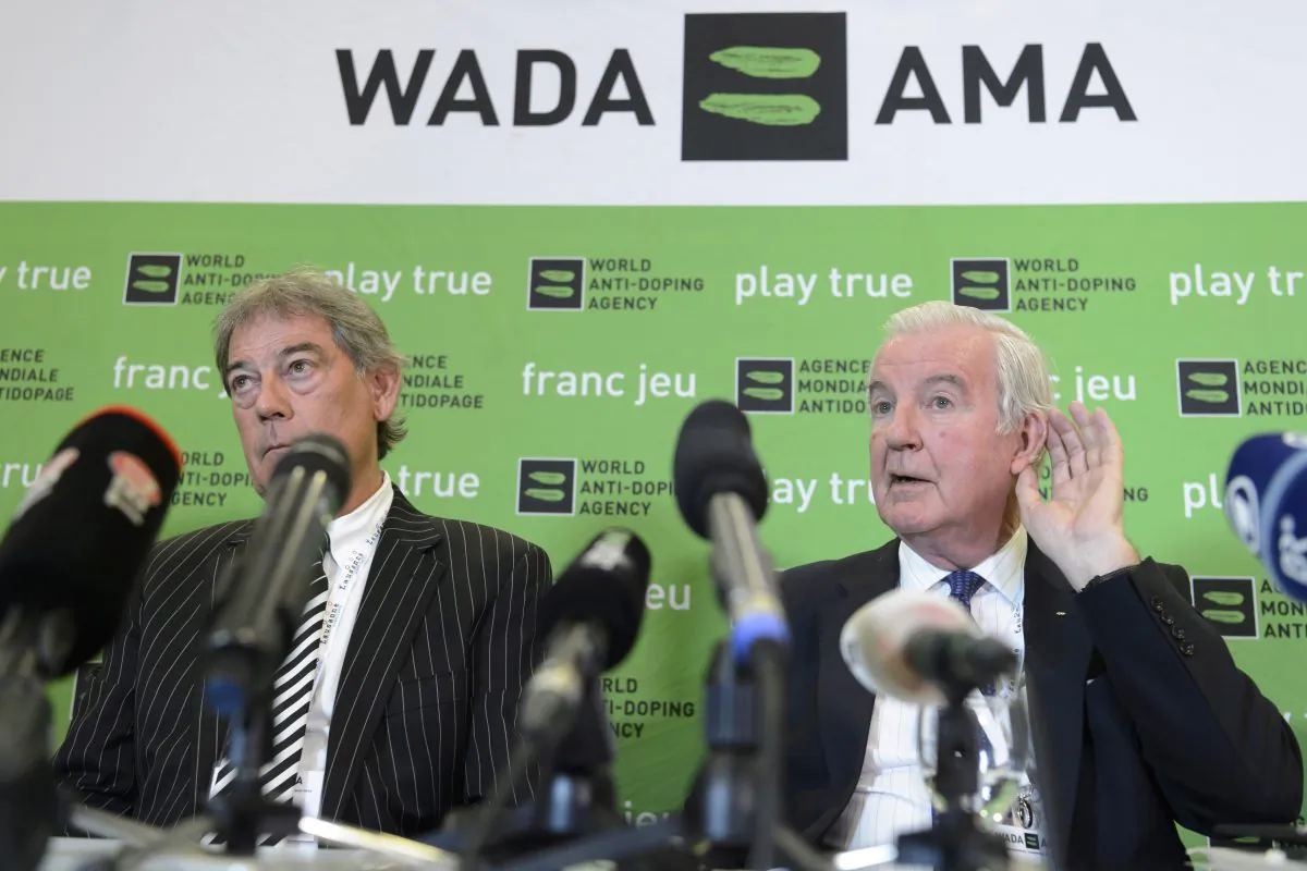 David Howman (L), from New Zealand, director-general of World Anti-Doping Agency (WADA), and Britain's Craig Reedie (R), president of WADA, at a press conference during the WADA Symposium for Anti-Doping Organizations (ADOs) in Lausanne, Switzerland, on March 14, 2016. (Laurent Gillieron/Keystone via AP)