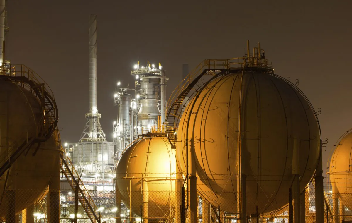 Close-up of an oil-refinery plant. Fossil fuels are the source of 86% of the world energy supply. (claffra/iStock)