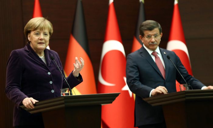 German Chancellor Angela Merkel (L) and Turkish Prime Minister Ahmet Davutoglu at a joint press conference in Ankara on Feb. 8, 2016. (Adem Altan/AFP/Getty Images)