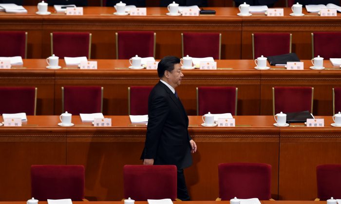 Chinese leader Xi Jinping arrives for the opening ceremony of the National People's Congress in the Great Hall of the People in Beijing on March 5, 2016.
(WANG ZHAO/AFP/Getty Images)
