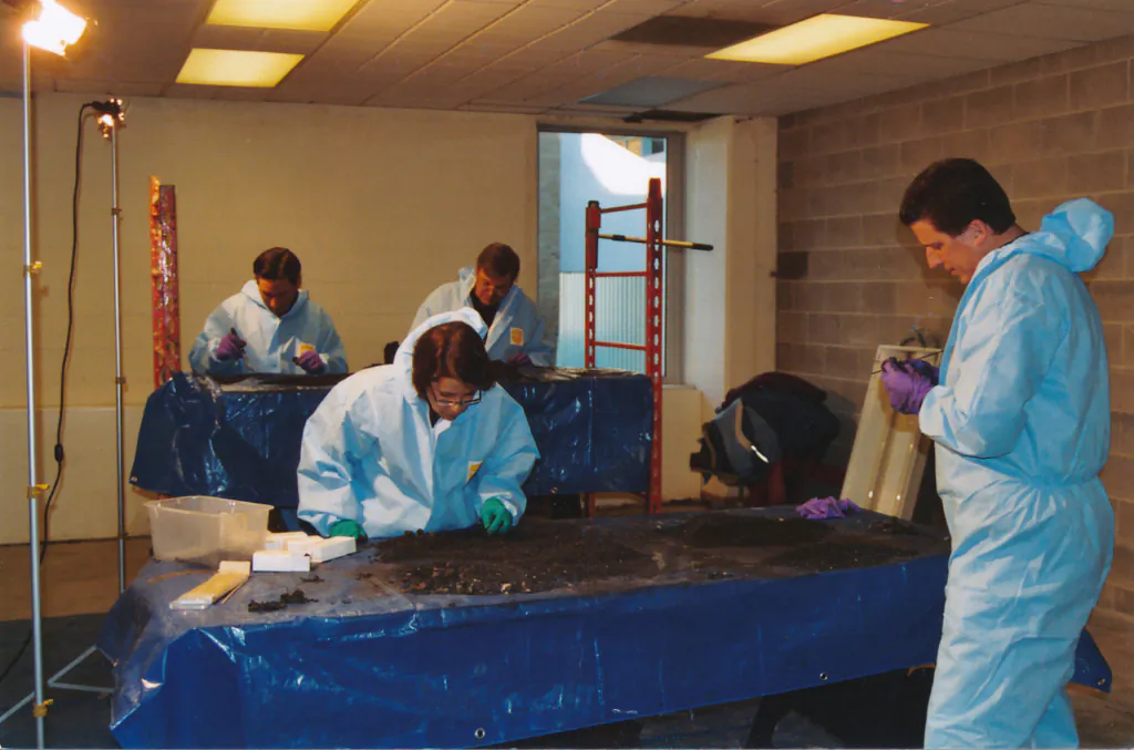 Forensic agents sifting through evidence found in Steven Avery's home (Netflix)