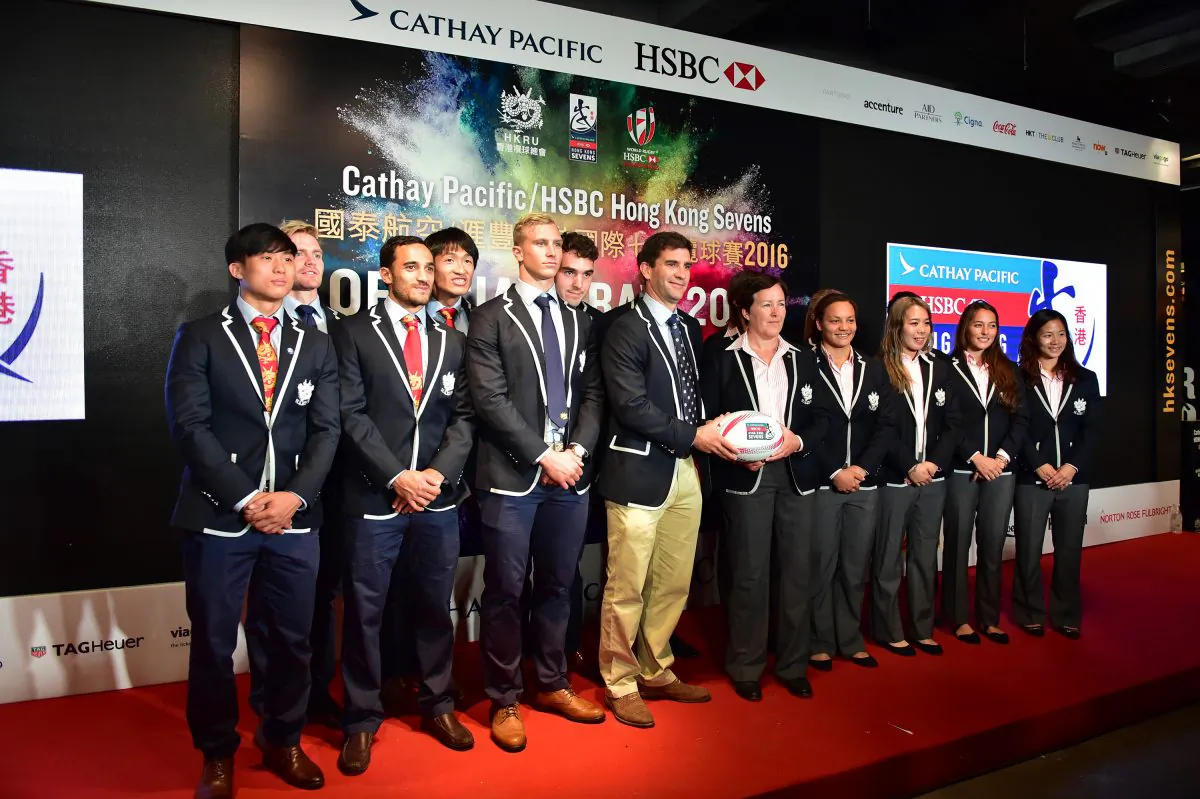 Men and women from the Hong Kong sevens teams plus their respective coaches, Gareth Baber and Anna Richard at the draw ceremony in Hong Kong on Monday March 14, 2016. (Bill Cox/Epoch Times)