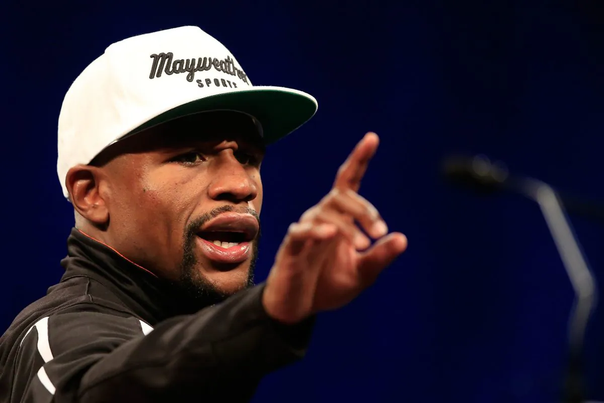 Boxing great Floyd Mayweather Jr. retired last year after going 49–0 for his career. (Jamie Squire/Getty Images)