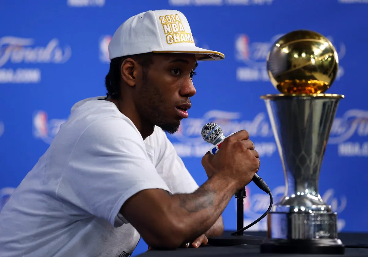 Kawhi Leonard was named NBA Finals MVP in 2014 after helping lead the San Antonio Spurs over the Miami Heat in five games. (Chris Covatta/Getty Images)