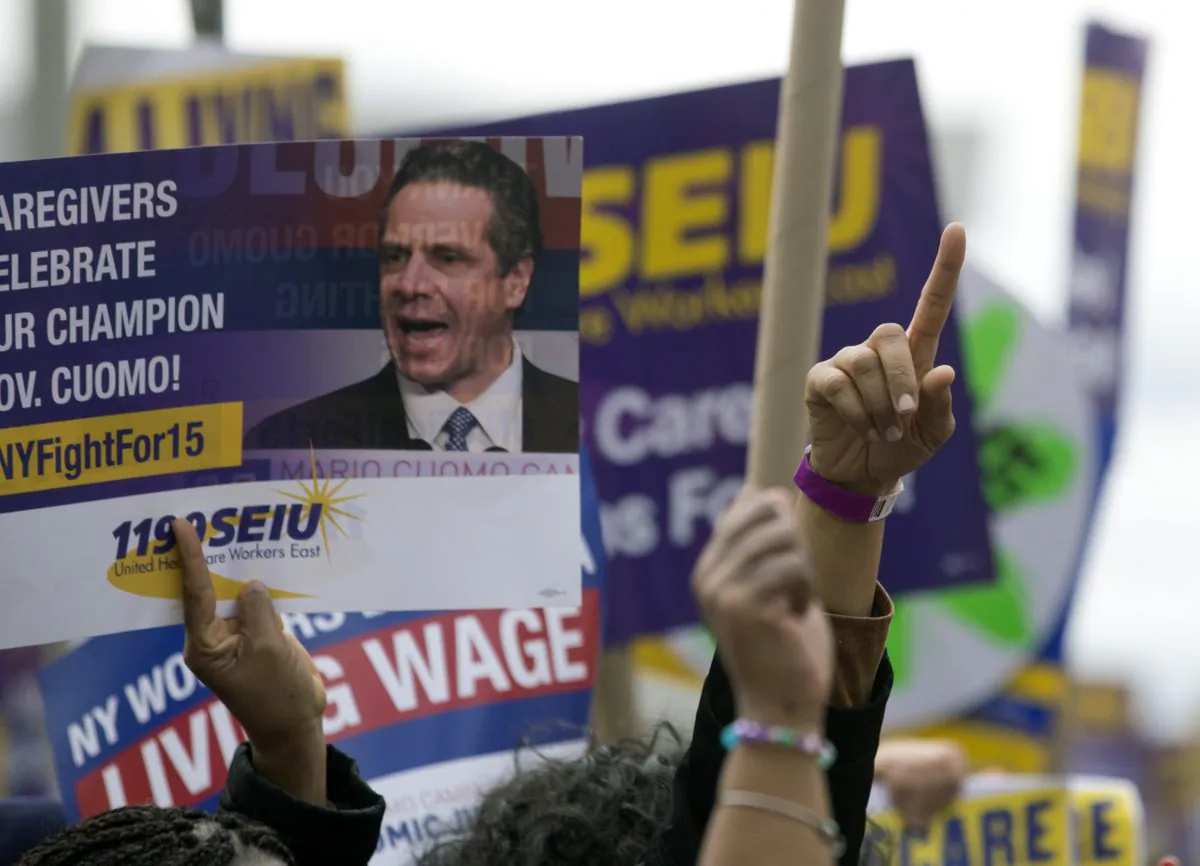 Supporter of a $15 minimum wage rally at the Empire State Plaza on Tuesday, March 15, 2016, in Albany, N.Y. (AP Photo/Mike Groll)