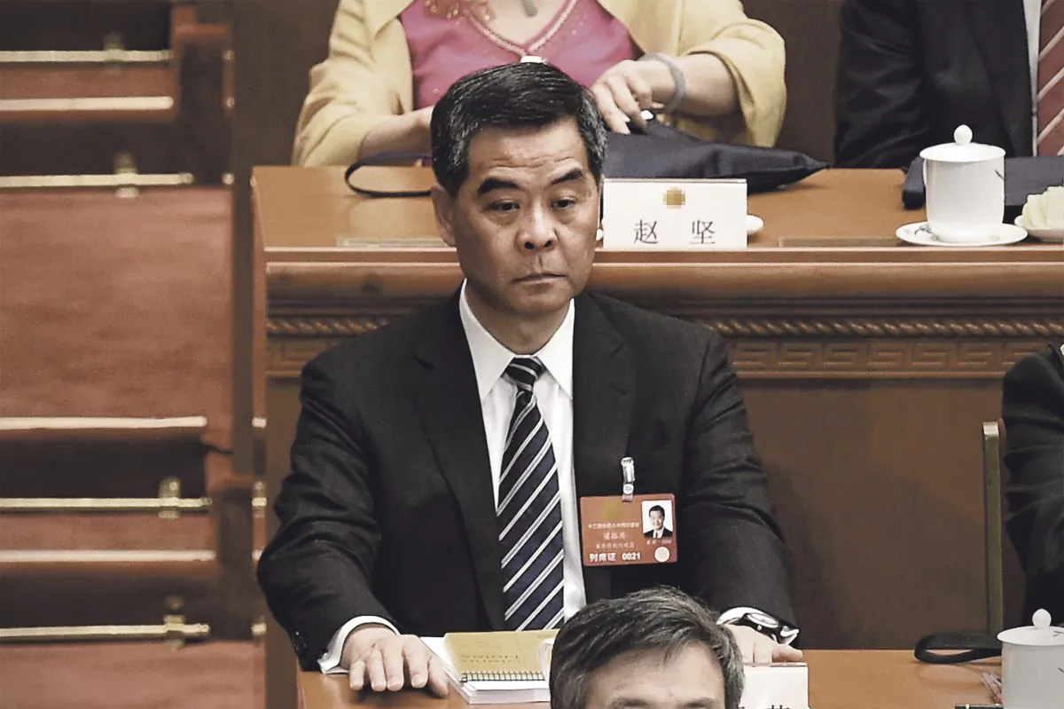 Leung Chun-ying attends the opening ceremony of the National People's Congress at the Great Hall of the People in Beijing on March 5, 2016. (Wang Zhao/AFP/Getty Images)