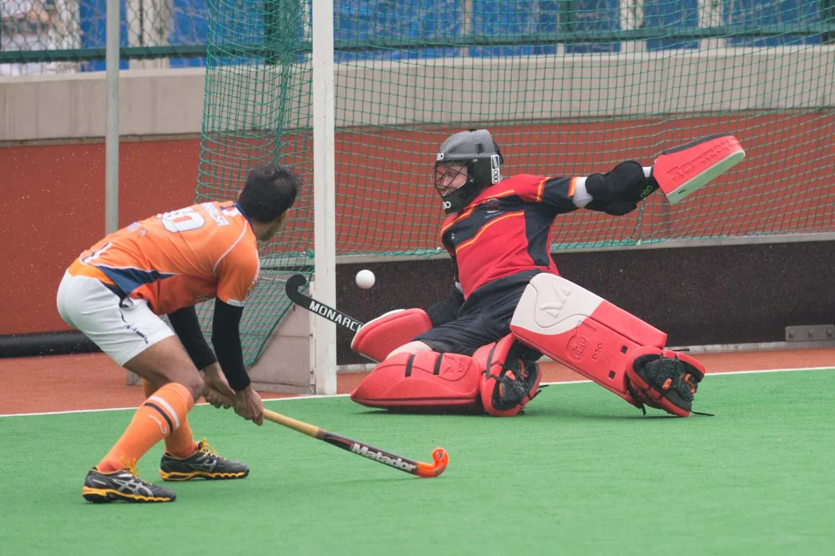 Arshad Muhammad of Khalsa tops off their score at 10:0 against HKCC in the HKHA Premier Division match at Hong Kong Football Club on Sunday March 13, 2016. (Bill Cox/Epoch Times)