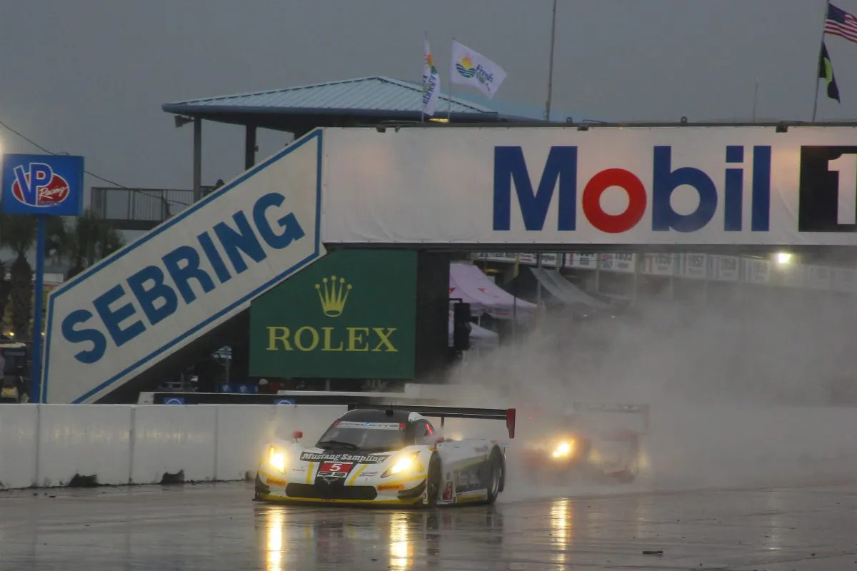 The #5 Action Express Racing Coyote-Corvette of Christian Fittipaldi and the #31 Action Express/Whelen Engineering Coyote-Corvette of Dane Cameron lead the race minutes before the red flag waves. (Chris Jasurek/Epoch Times)