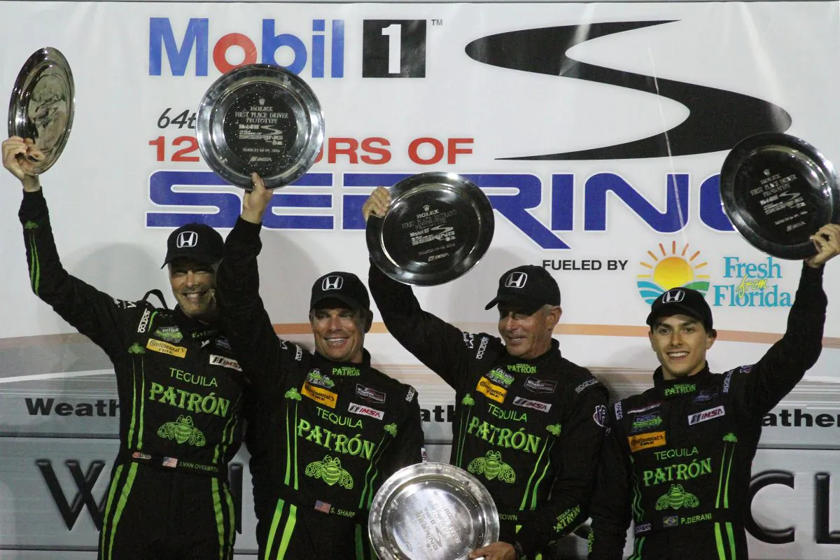 Extreme Speed Motorsports drivers Johannes van Overbeek, Scott Sharp, Ed Brown, and Luis Felipe Derani celebrate winning the Mobil 1 Twelve Hours of Sebring. (Chris Jasurek/Epoch Times)