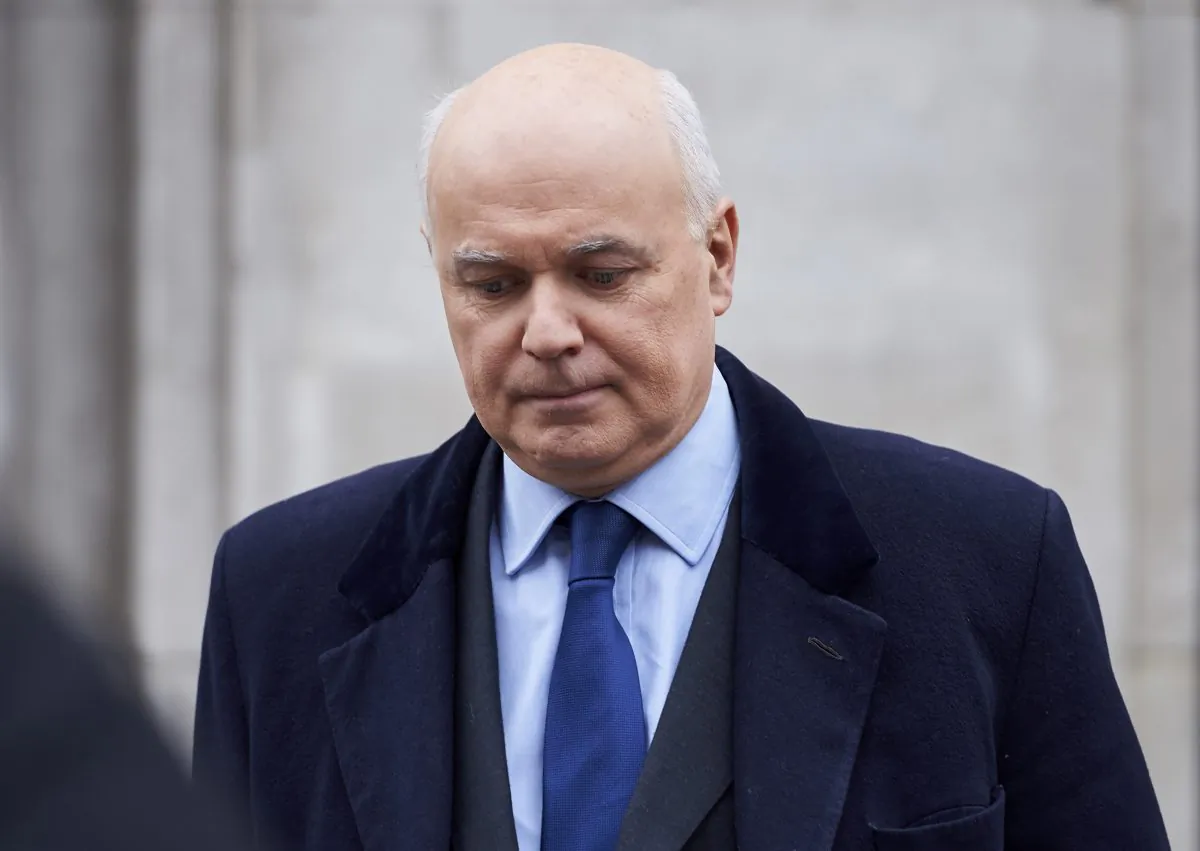 Britain's former welfare minister Iain Duncan Smith leaves the BBC television center in London after appearing on "The Andrew Marr Show" on March 20, 2016. In his first interview since resigning Friday, March 18, Iain Duncan Smith accused Cameron of trying to reduce Britain's budget deficit through benefit cuts which were unfairly hurting poorer voters while protecting older, richer ones. Duncan Smith, who last month became one of the most prominent Conservatives to say he would campaign against Cameron for Britain to leave the EU on June 23, denied his shock resignation was about Europe. (Niklas Halle'n/AFP/Getty Images)