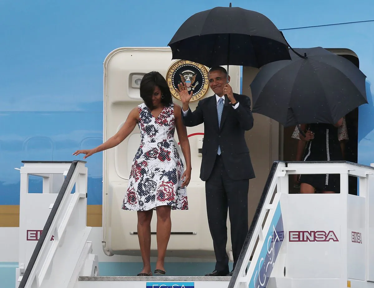 First lady Michelle Obama, President Barack Obama, Malia Obama and Sasha Obama arrive at Jose Marti International Airport for a 48-hour visit on Airforce One March 20, 2016 in Havana, Cuba. (Joe Raedle/Getty Images)