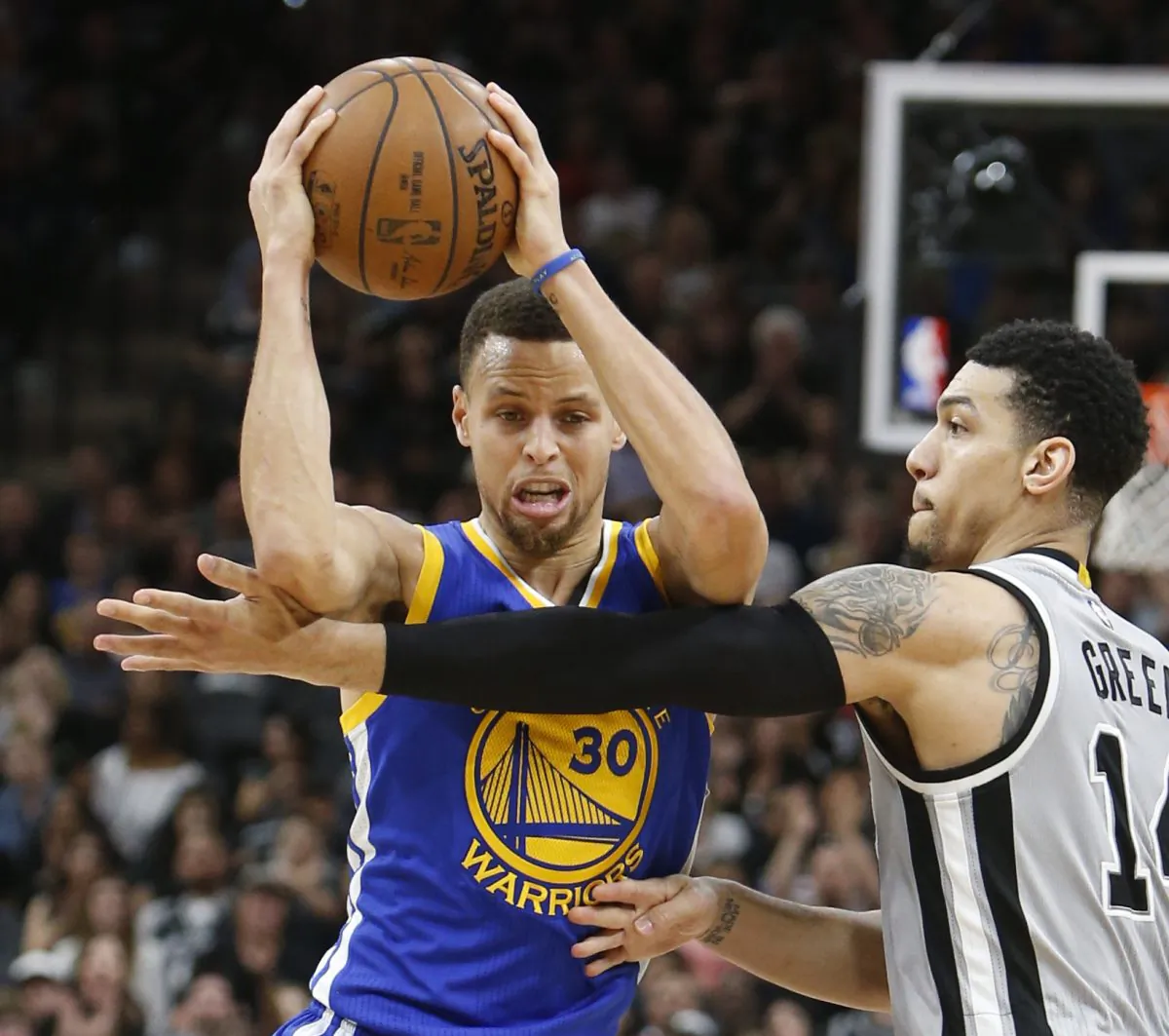 Stephen Curry of the Golden States Warriors scored just 14 points in a loss to the San Antonio Spurs. (Ronald Cortes/Getty Images)