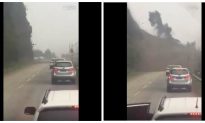 Chinese Drivers Narrowly Avoid Being Washed Away by Mudslide (Video)