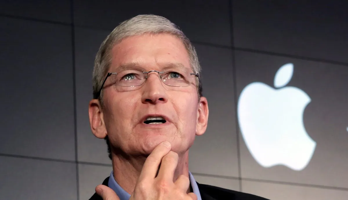 In this April 30, 2015 file photo, Apple CEO Tim Cook responds to a question during a news conference at IBM Watson headquarters, in New York. The dispute over whether Apple must help the FBI hack into a terror suspect's iPhone is about to play out in a Southern California courtroom. The hearing Tuesday, March 22, in U.S. District Court in Riverside is the first in the battle that has seen Cook and FBI Director James Comey spar over issues of privacy and national security. (AP Photo/Richard Drew, File)