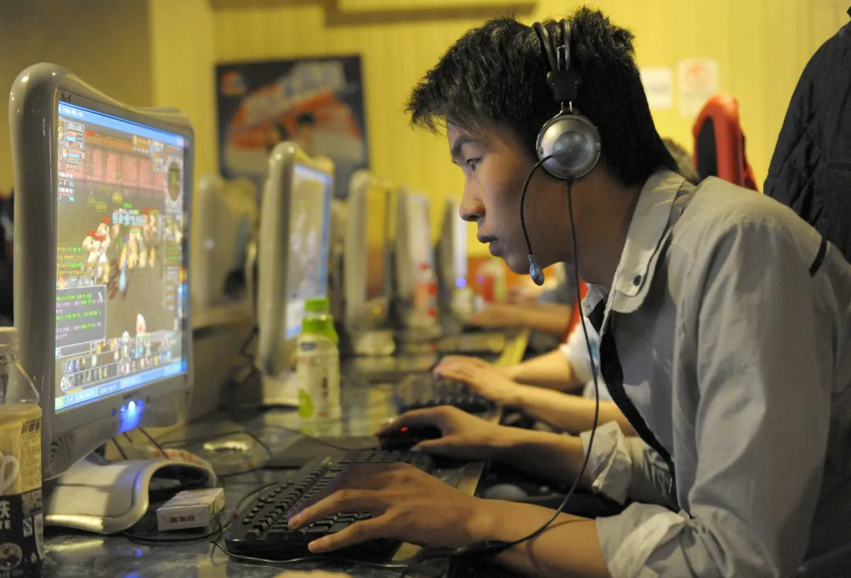 A Chinese man plays online games at an internet cafe in Beijing, China on Feb. 27, 2010. (Liu Jin/AFP/Getty Images)