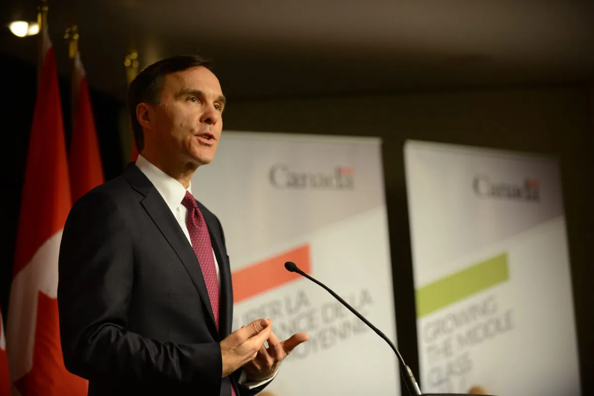 Canadian finance minister Bill Morneau speaks to reporters prior to delivering the newly elected Liberal government’s first budget on March 22, 2016 in Ottawa, Canada. (Matt Little/Epoch Times)