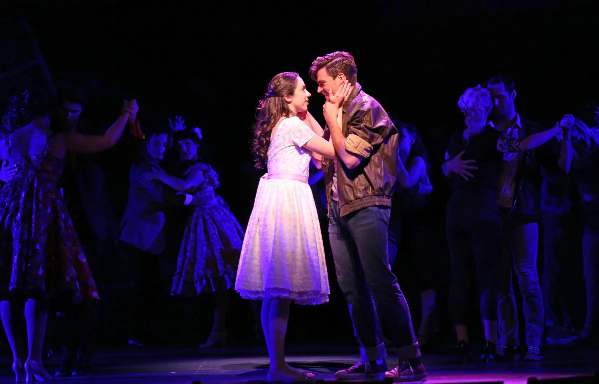 Maria (Zoe Nadal) and Tony (Will Skrip) meet and instantly fall in love, in “West Side Story.” (Liz Lauren)