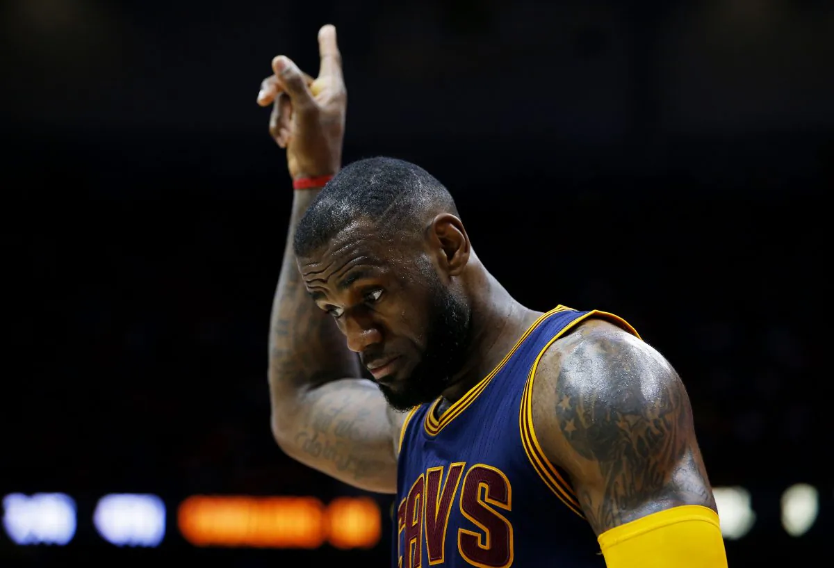 LeBron James put up a triple-double Monday to lead the Cleveland Cavaliers to a 124–91 win over Denver that sealed Cleveland's second straight division title. (Kevin C. Cox/Getty Images)