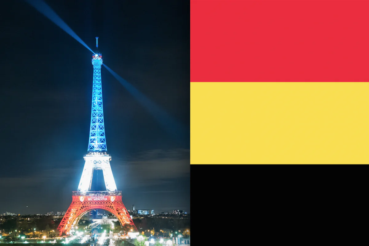 Eiffel tower illuminated in colors of French Tricolour on November 18, 2015, and the Belgium flag (Mstyslav Chernov/Wikicommons)
