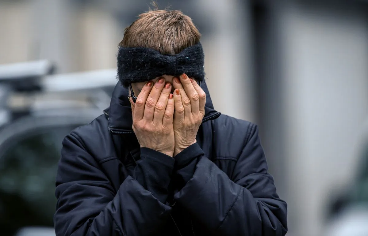 A woman reacts outside the Maelbeek-Maalbeek metro station in Brussels on March 23, 2016, a day after the station and the Brussels-Zaventem Airport were attacked by triple blasts that killed 31 people and left around 250 injured. (Philippe Huguen/AFP/Getty Images)