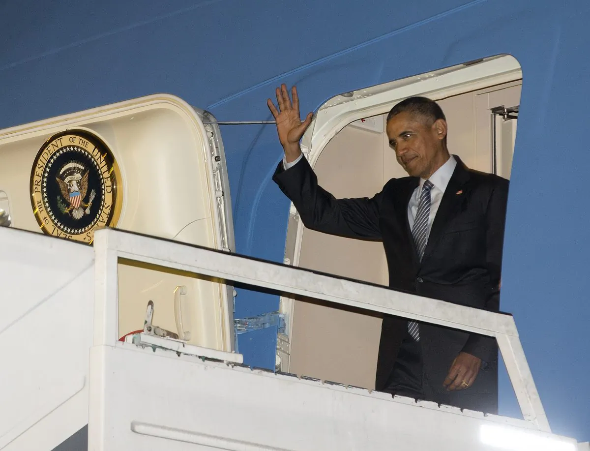 President Barack Obama exits Air Force One at the international Buenos Aires airport, Argentina, early Wednesday, March 23, 2016. Obama is on a two day official visit to Argentina. (AP Photo/Pablo Martinez Monsivais)