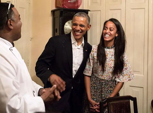 At a restaurant in Old Havana, Malia and President Obama laugh as she translates from Spanish to English. (Pete Souza/White House)
