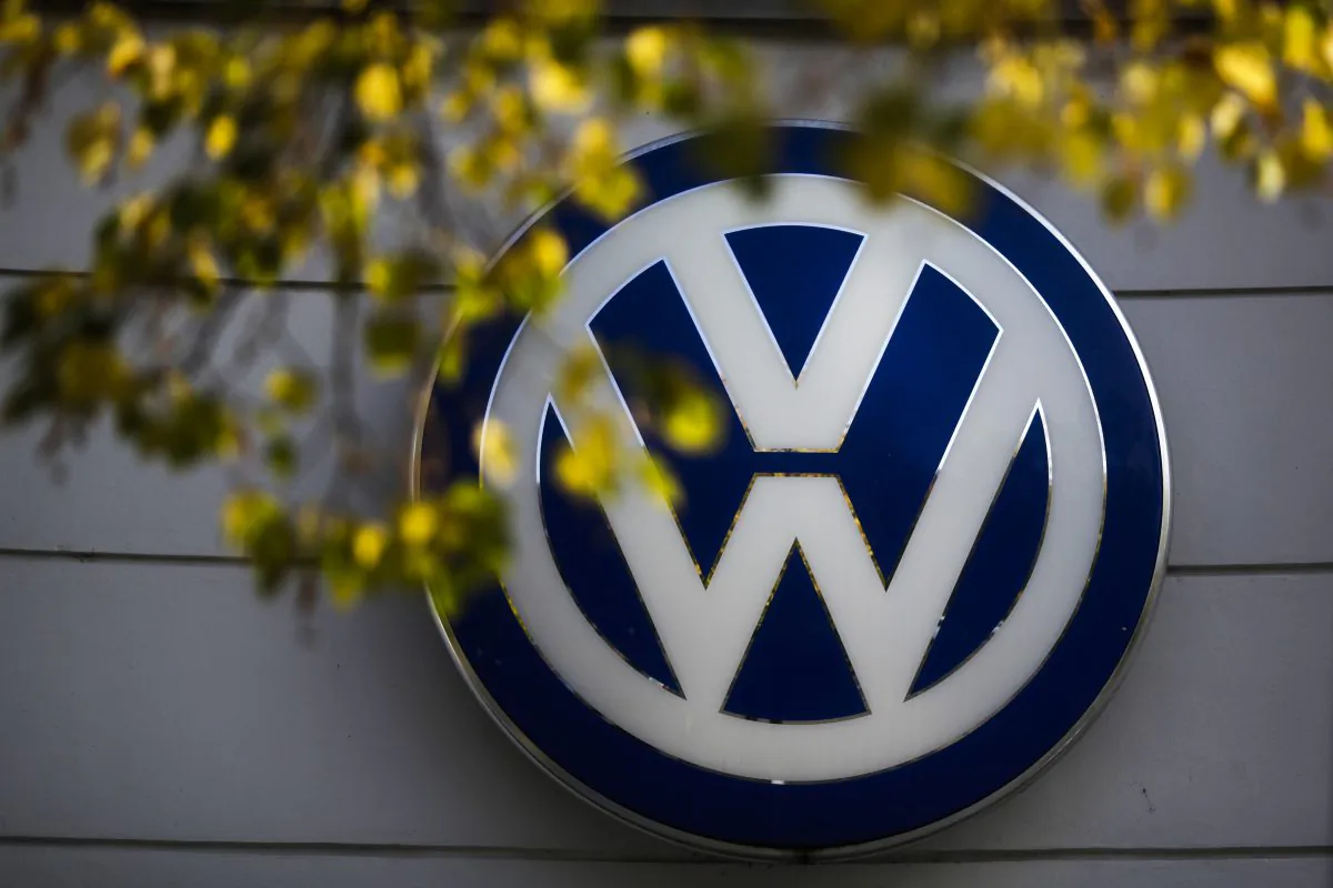 The VW sign of Germany's Volkswagen car company is displayed at the building of a company's retailer in Berlin, Germany, on Oct. 5, 2015. (Markus Schreiber/AP Photo, File)