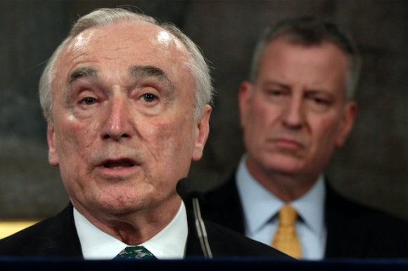 New York City Police Commissioner William Bratton, left, speaks during a news conference in New York's City Hall, as New York Mayor Bill de Blasio listens, Tuesday, Jan. 12, 2016. (Richard Drew/AP)