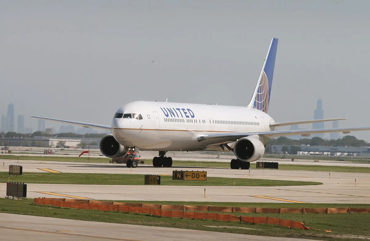 CHICAGO, IL - SEPTEMBER 19: A United Airlines jet taxis at O'Hare International Airport on September 19, 2014 in Chicago, Illinois. In 2013, 67 million passengers passed through O'Hare, another 20 million passed through Chicago's Midway Airport, and the two airports combined moved more than 1.4 million tons of air cargo. (Photo by Scott Olson/Getty Images)