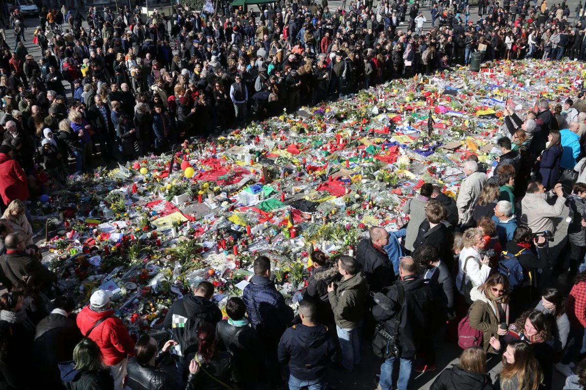 People gather in the Place de la Bourse in Brussels, Belgium, on March 27, 2016, to pay tribute to the victims of the March 22 attacks in Brussels. (Sylvain Lefevre/Getty Images)