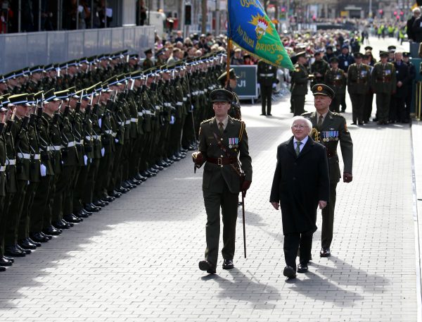 Irish President Michael D. Higgins (R) prepares to lay a wreath at the General Post Office on O'Connell Street, Dublin, Ireland, on March, 27, 2016. (AP Photo/Peter Morrison)