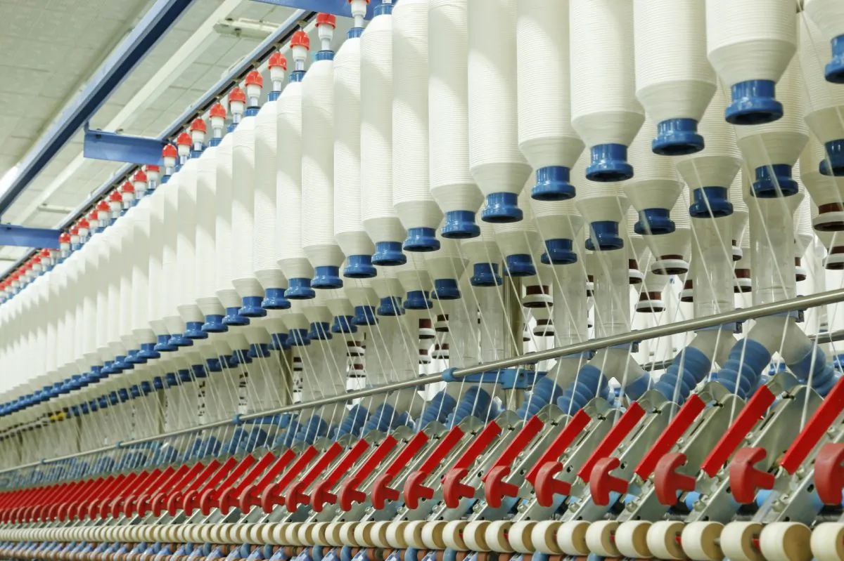 An automated spinning mill workshop. (zhengzaishuru/iStock)