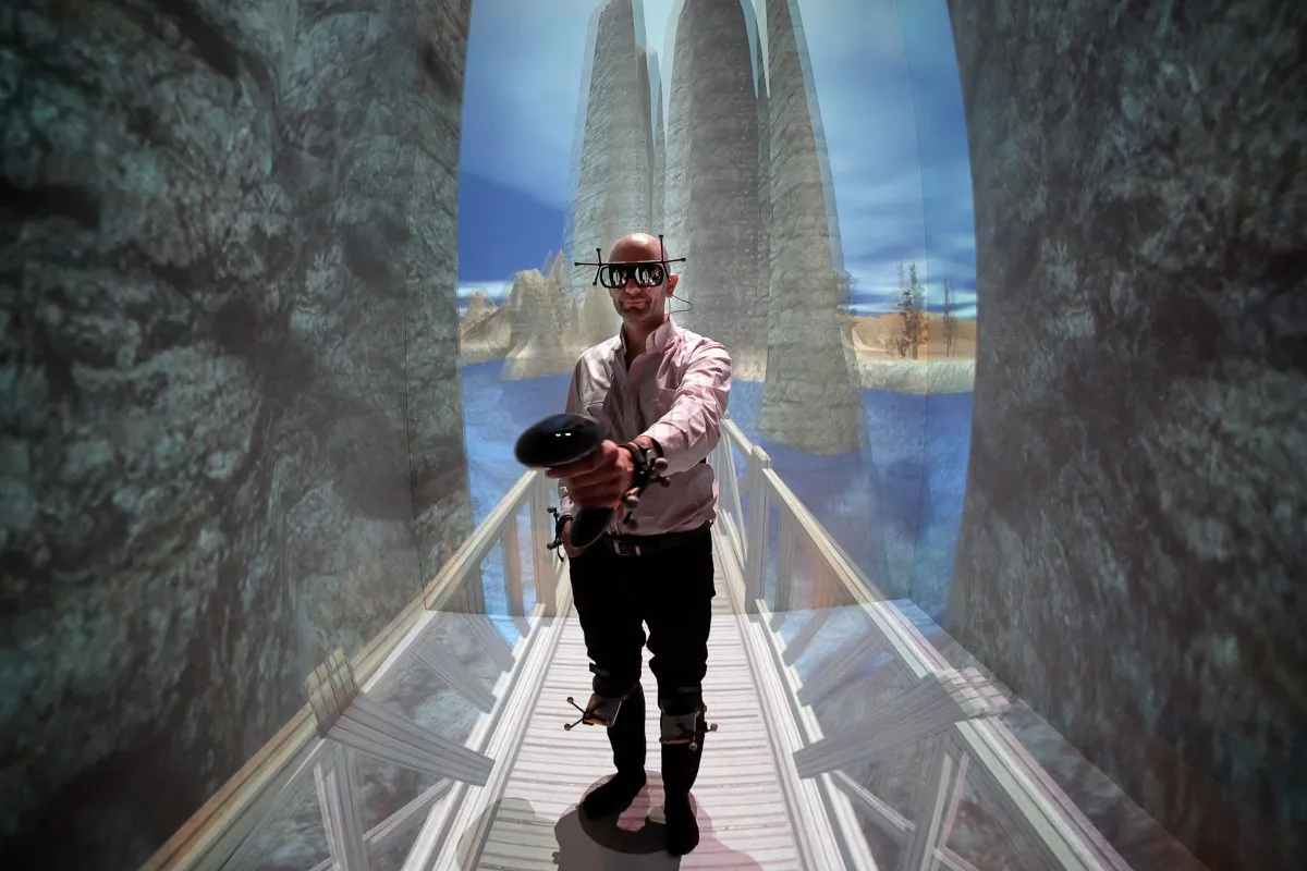 French patient Denis Duet wearing a virtual reality (VR) headset undergoes a VR therapy session called "CtrlStress" at the laboratory of the Institut des Sciences du Mouvement (The Institute of Movement Sciences) in Marseille on Jan. 26, 2016. Since 2012, Doctor Eric Malbos has been using virtual reality sessions at the institute as a form of treatment for patients suffering from phobias like claustrophobia and acrophobia. (Boris Horvat/AFP/Getty Images)