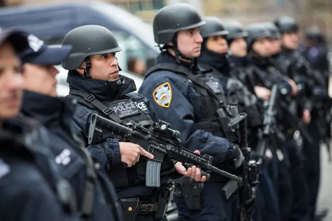 Members of the NYPD Strategic Response Group, which is funded in part through the Urban Area Security Initiative grant, stand outside NYPD headquarters in New York City on Feb. 17, 2016. (Andrew Burton/Getty Images)