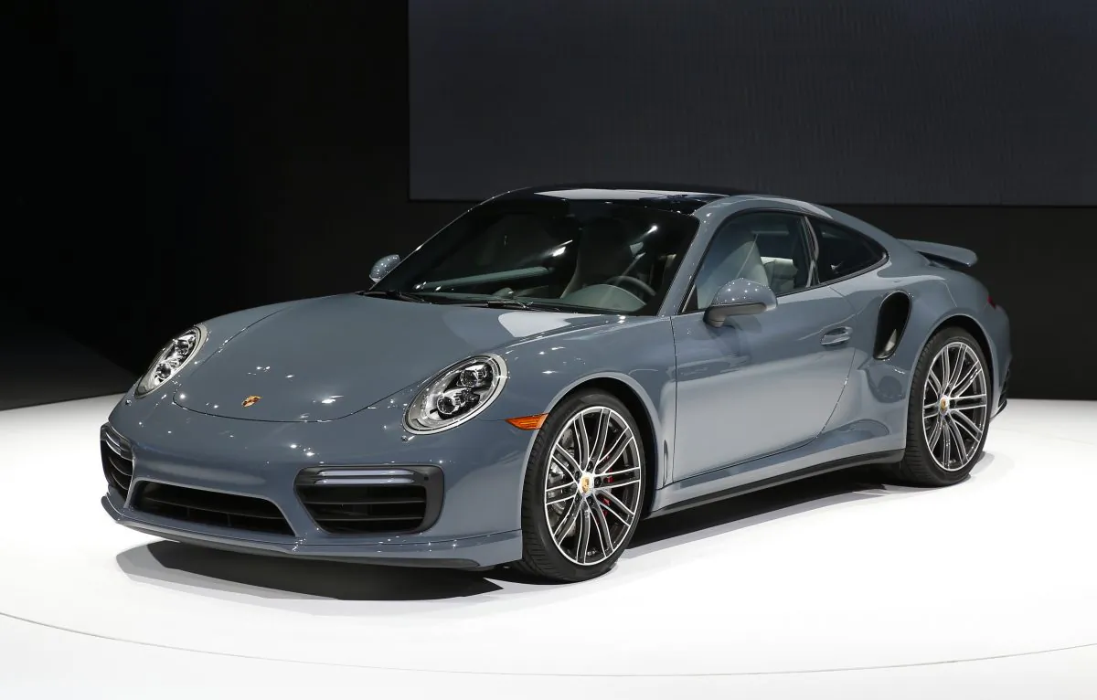 The Porsche 911 Turbo debuts at the North American International Auto Show in Detroit, Monday, Jan. 11, 2016. (AP Photo/Paul Sancya)