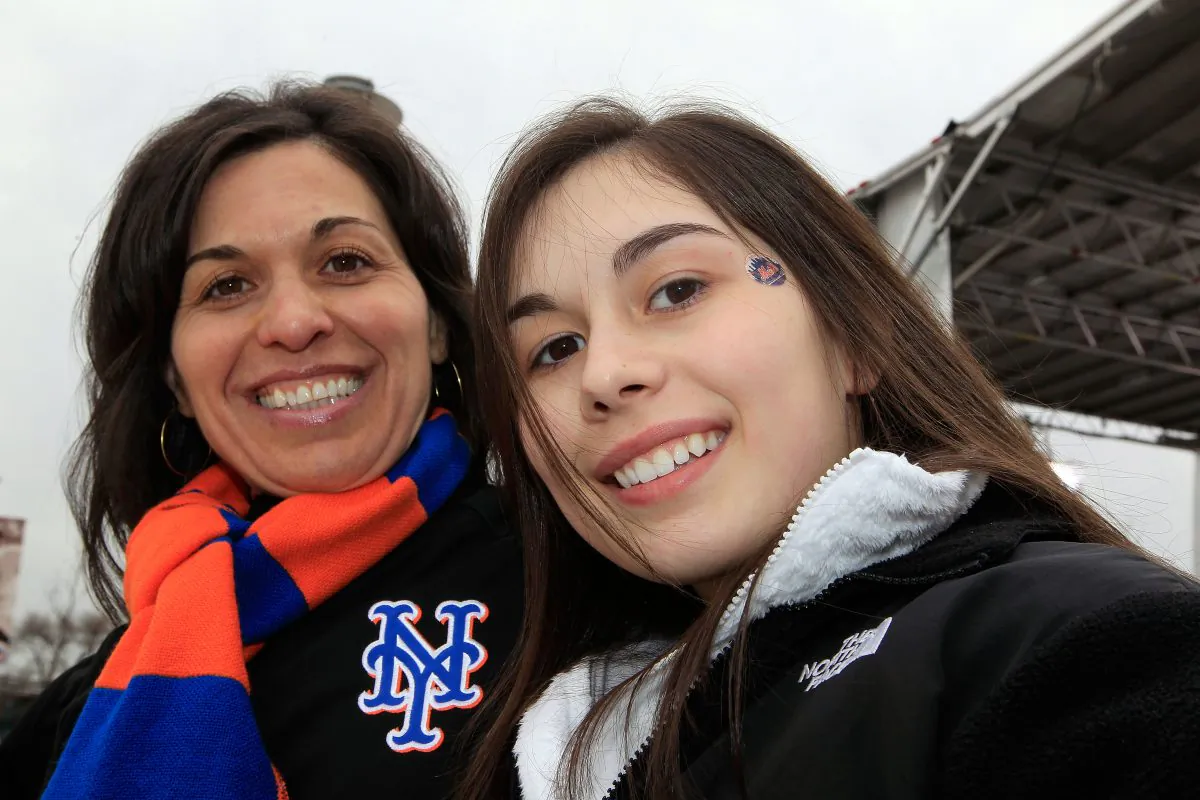 Rose (L) and Julia Wonsley, fans of the New York Mets support their team outside the staium prior to playing against the Washington Nationals during the Mets' Home Opener at Citi Field on April 8, 2011. (Chris Trotman/Getty Images)