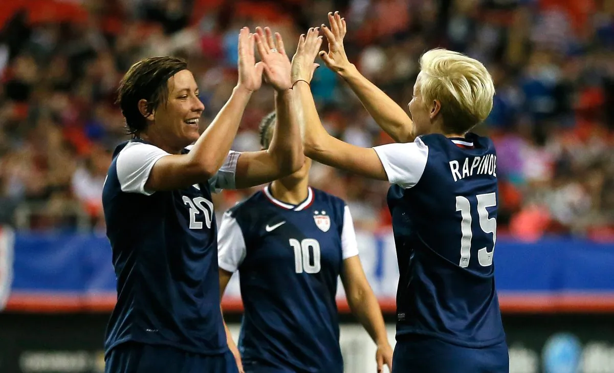 Abby Wambach #20 and Megan Rapinoe #15 of the United States celebrate Wambach's goal against Russia at Georgia Dome on February 13, 2014 in Atlanta, Georgia. (Photo by Kevin C. Cox/Getty Images)