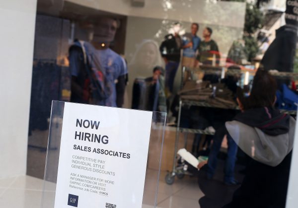 A "now hiring" sign