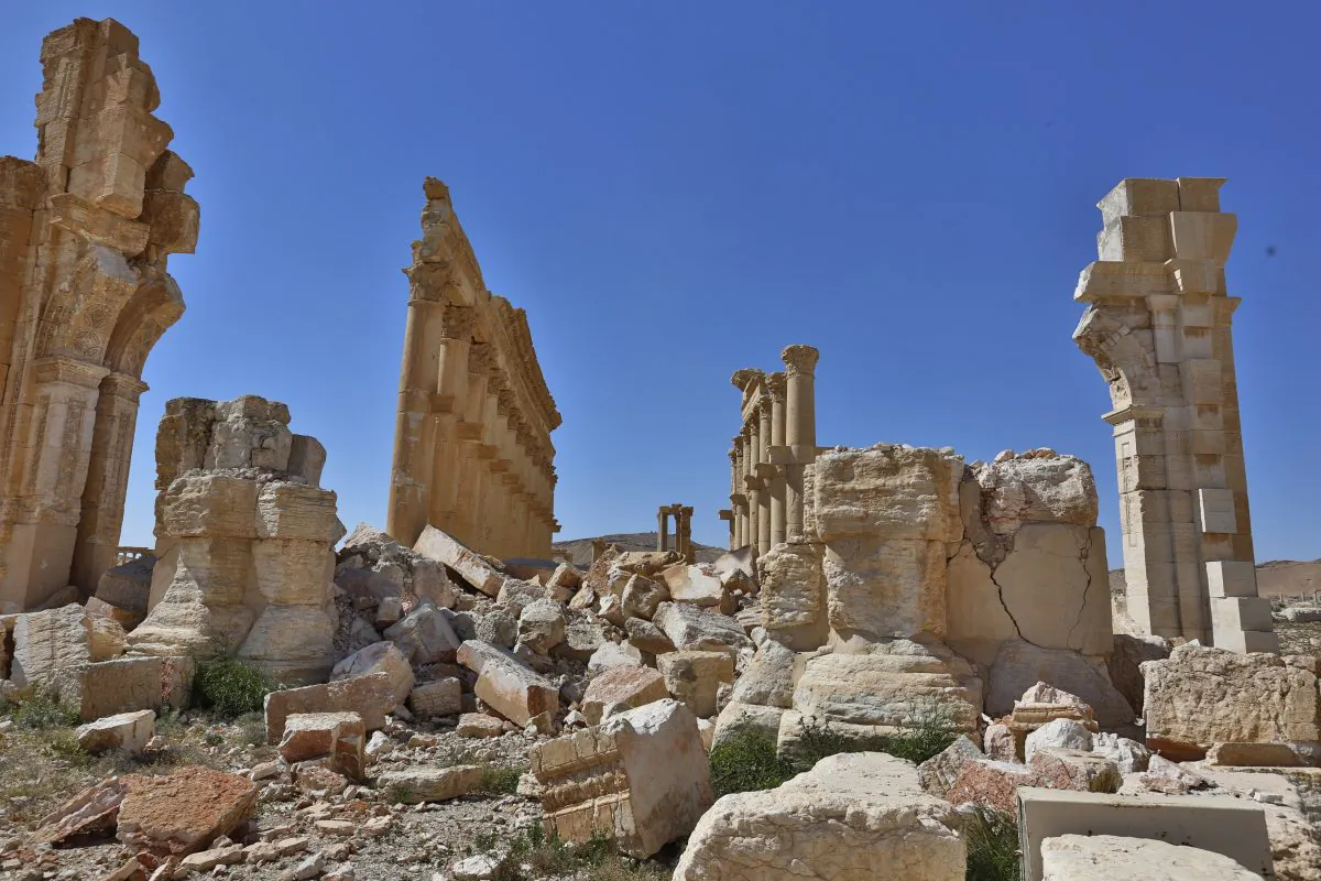 In this picture taken Friday, April 1, 2016, damage is seen in the ancient city of Palmyra in the central city of Homs, Syria. (AP Photo)