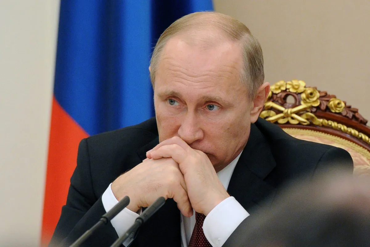 Russian President Vladimir Putin holds a government meeting in Moscow on March 25, 2015. Putin is allegedly dating Rupert Murdoch's ex-wife, Wendi Deng. (Mikhail Klimentyev/AFP/Getty Images)