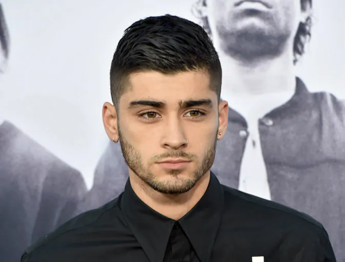 Zayn Malik arrives at the premiere of Universal Pictures and Legendary Pictures' "Straight Outta Compton" at the Microsoft Theatre on August 10, 2015 in Los Angeles, California.