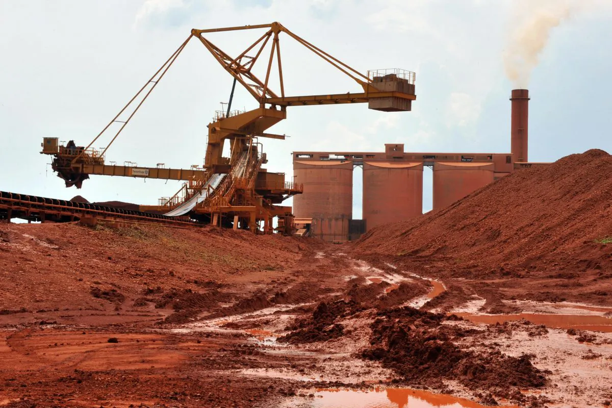 Bauxite is processed at Guinea's largest bauxite mining firm, Compagnie des Bauxites de Guinee (CBG), at Kamsar, a town north of the capital Conakry, on Oct. 23, 2008. (Georges Gobet/AFP/Getty Images)
