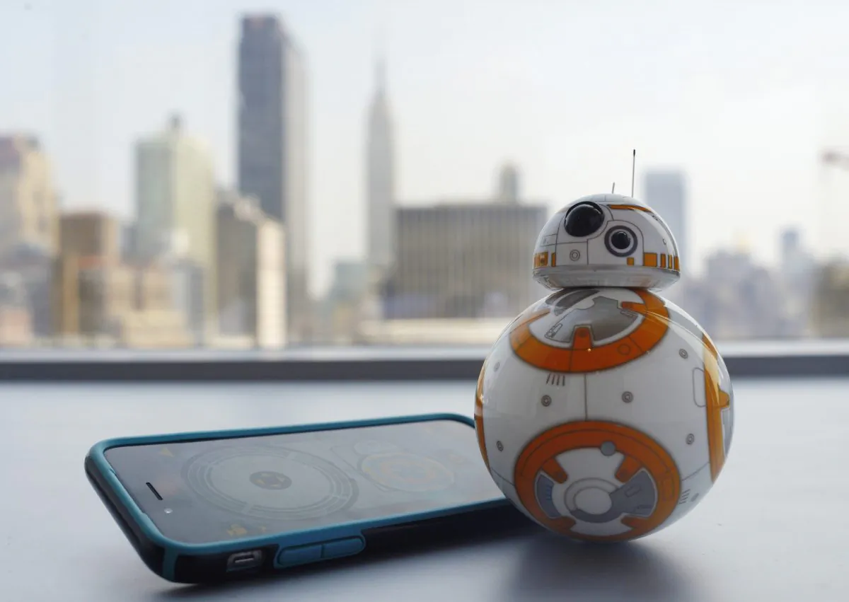 This Thursday, Sept. 3, 2015 photo shows Sphero's BB-8 droid toy in New York. The BB-8 is controlled with a smartphone or tablet app and responds to basic voice commands such as wake up, and look around. Its just under 5-inches tall and makes cute little Droid sounds reminiscent of R2-D2. (AP Photo/Patrick Sison)