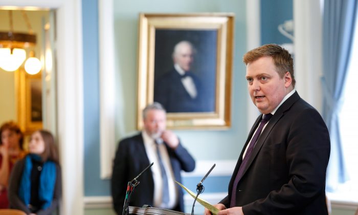 Iceland's Prime Minister Sigmundur David Gunnlaugsson, speaks during a parliamentary session in Reykjavik on Monday April 4, 2016. Iceland's prime minister insisted Monday he would not resign after documents leaked in a media investigation allegedly link him to an offshore company that would represent a serious conflict of interest, according to information leaked from a Panamanian law firm at the center of an international tax evasion scheme. (AP Photo/Brynjar Gunnarsson)
